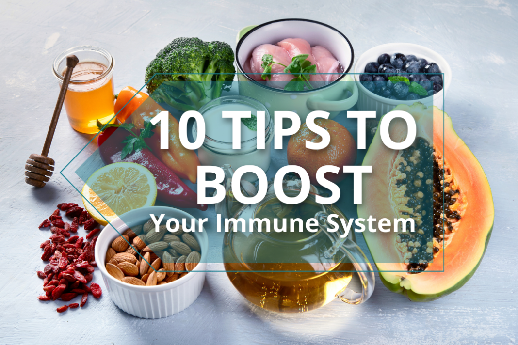 Fresh fruits, vegetables, nuts, and honey displayed to show how to boost your immune system naturally.